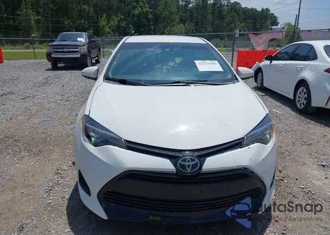 2017 Toyota Corolla Le from USA, damaged, VIN 5YFBURHE7HP661401